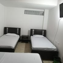 Habitación con camas individuales